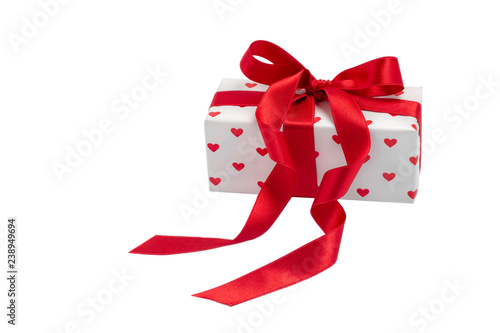 box with a gift with the image of hearts tied with a ribbon isolate on a white background. Valentine's Day celebration concept