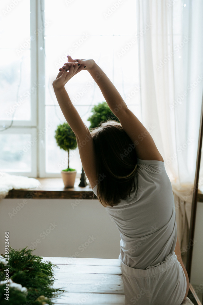 Fototapeta premium young girl morning exercise hands beauty health