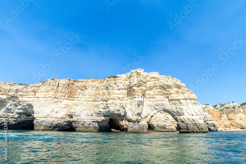 Limestone formations on the coastline and beach of Algarve, Benagil, Portugal