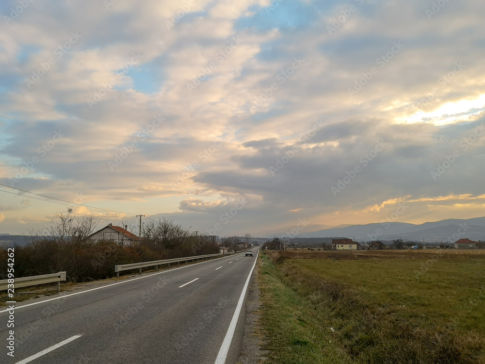 Fototapeta premium Street of town at sunset. Kragujevac town in central Serbia.
