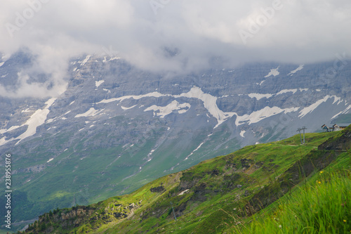 Alpine peaks landskape background. Jungfrau, Bernese highland. Alps, tourism, journey, hiking concept. © Acronym