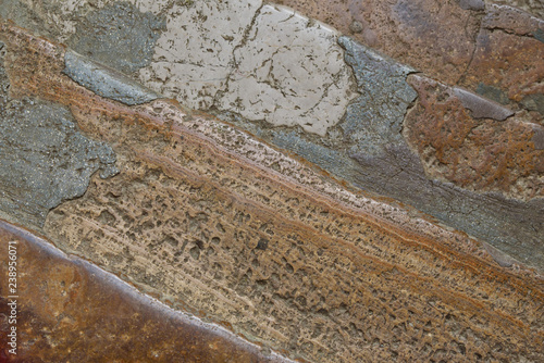 closeup of the old stone stairs, abstract textured background, diagonal lines