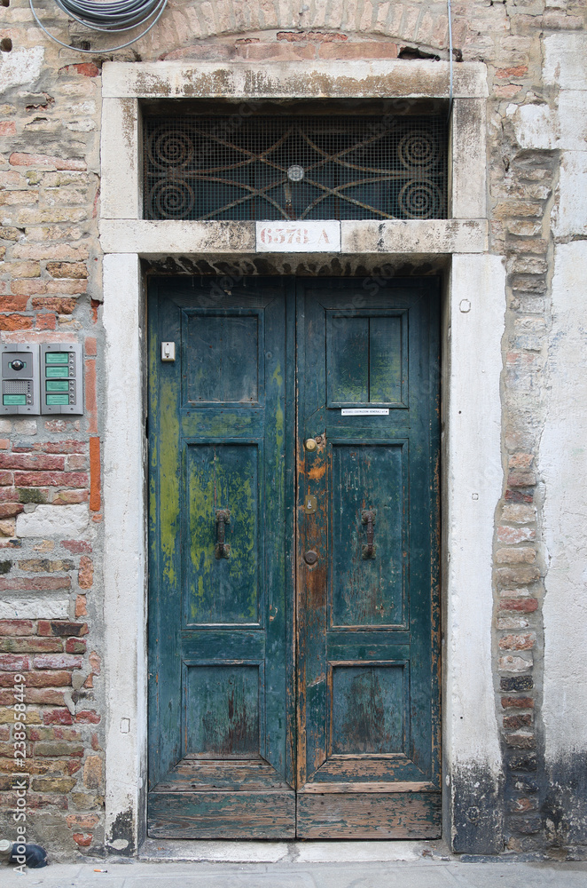Old Green door in Venice Italy
