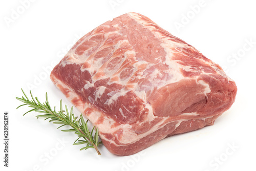 Raw pork neck boneless with rosemary, isolated on white background. Close-up