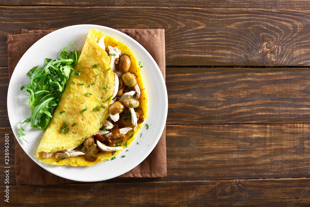 Omelette with mushrooms, chicken meat, greens Omelette with mushrooms, chicken meat, greens