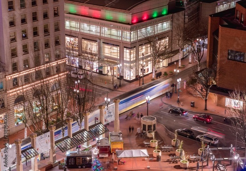 Busy intersection in city at night.