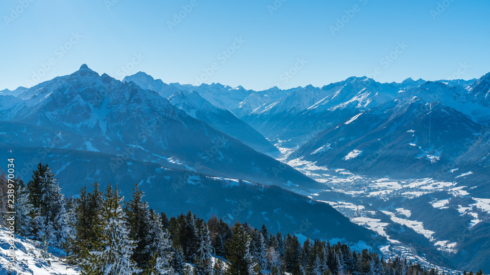 snow covered valley in the alps in austria