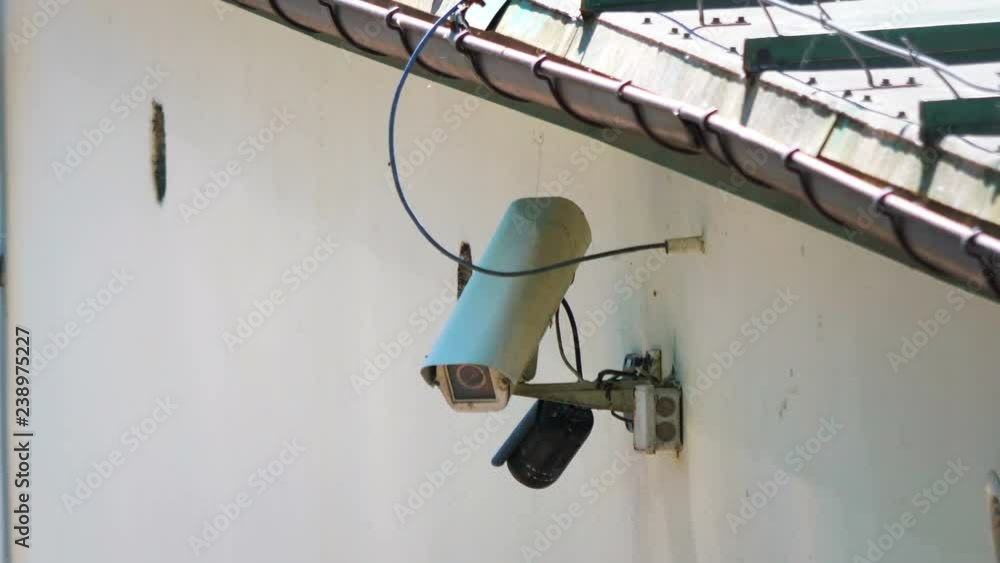 Security camera on the wall in 4K slow motion 60fps Security camera on the wall in 4K slow motion 60fps