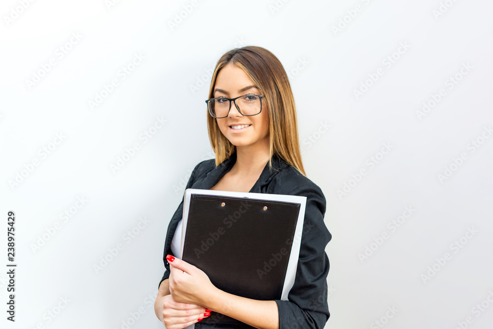 Businesswoman preparing documents for her meeting. Businesswoman preparing documents for her meeting.