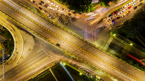 Beautiful crossroads with lights of vehicle