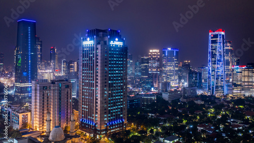 Skyscrapers with glowing light in Jakarta downtown