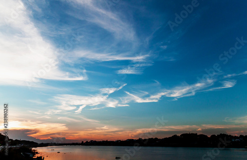 Beautiful sunset with clouds River view In the evening