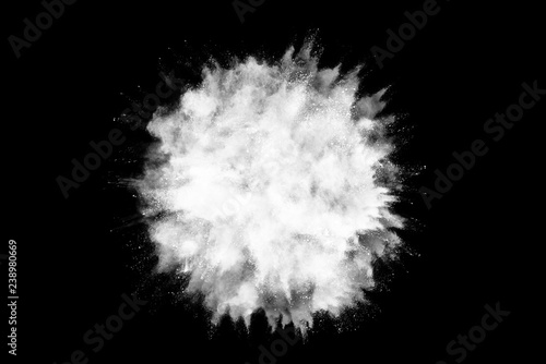 White powder explosion on black background.  photo