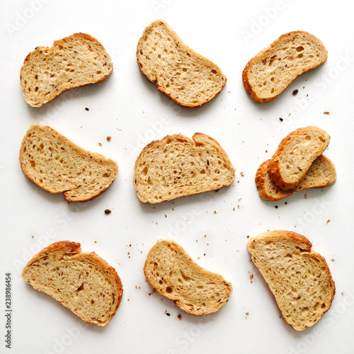 Fotografie Set of slices toast bread isolated on a white background, top view