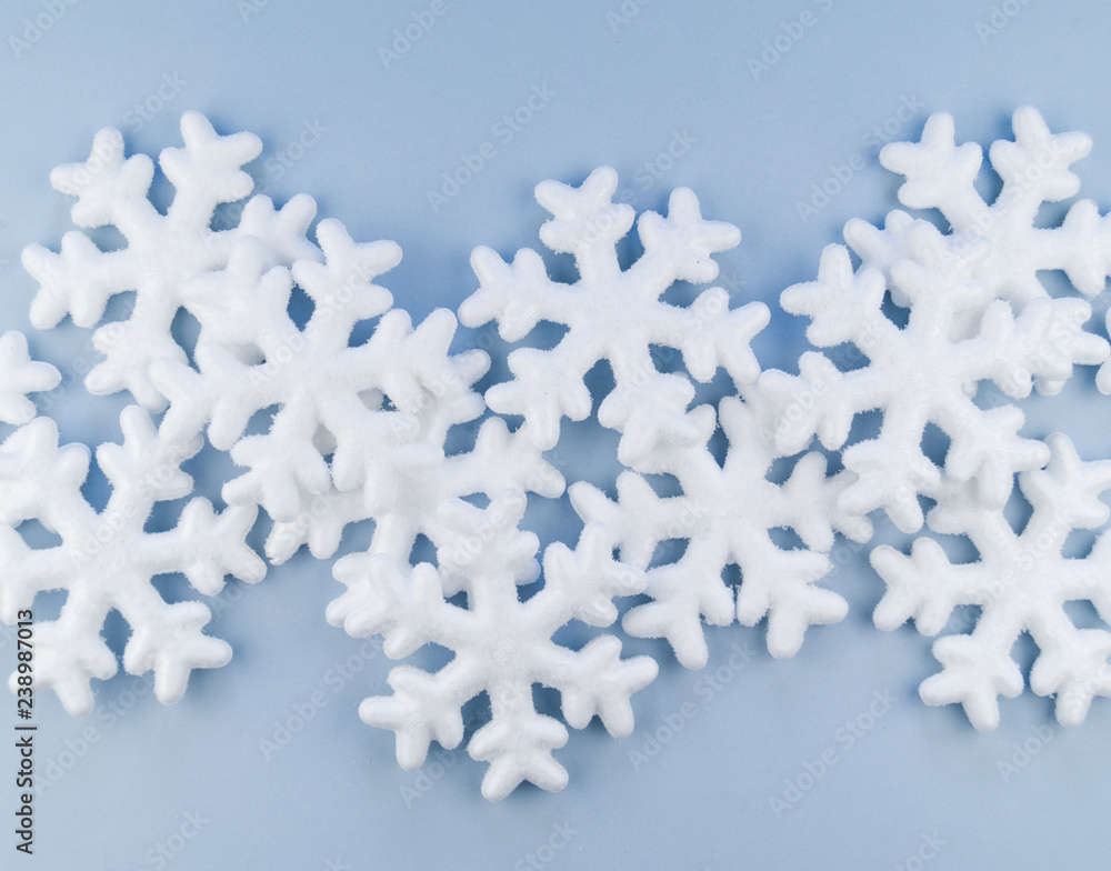 Pattern of decorative snowflakes on a blue background Pattern of decorative snowflakes on a blue background