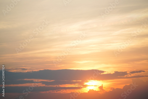 Beautiful orange sunset sunrise with clouds sky in nature.Landscape concept with copy space empty blank for text or montage design.Twilight golden time.Nature,Backdrop Concept.