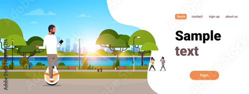 man ride electric mono wheel using smartphone guy modern personal transport outdoor nature city urban park cityscape sunset background horizontal copy space flat