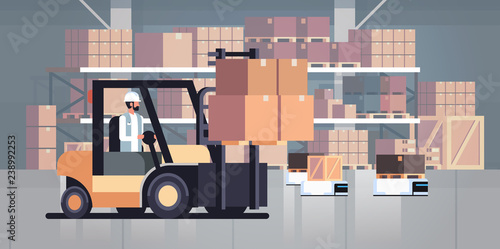 man driving forklift loader pallet truck warehouse robot car parcel box delivery logistic transport concept industrial goods storage room interior horizontal