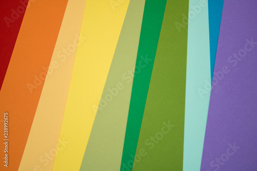 many different sheets of colored paper are folded in order