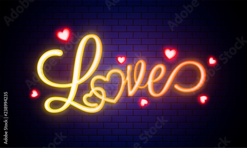 Glowing text Love with heart shapes on blue brick wall.