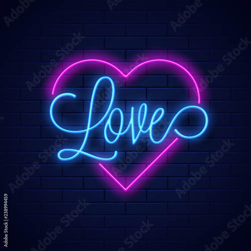 Neon text love and heart shape on blue brick wall background.