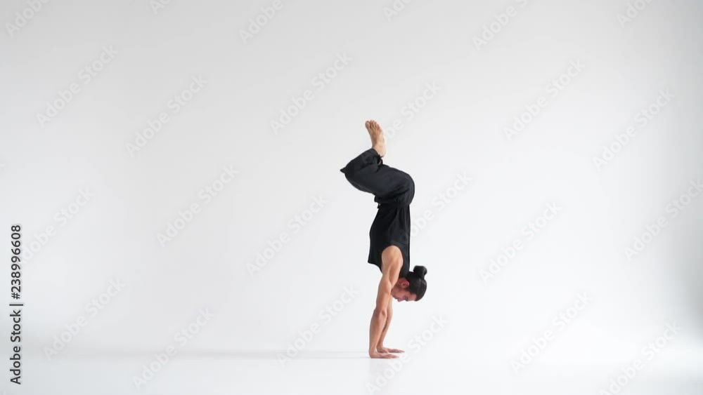 Man practicing yoga asanas Man practicing yoga asanas