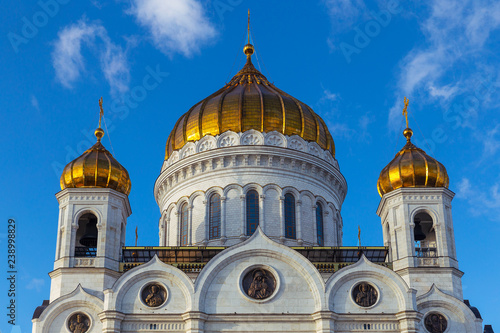 Closeup view of Cathedral of Christ the Saviour facade in Moscow with blue sky background