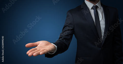 Businessman without head holding something without theme