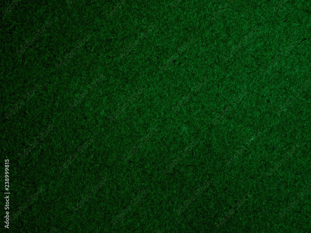 Texture of dark green cardboard closeup, abstract paper background Texture of dark green cardboard closeup, abstract paper background