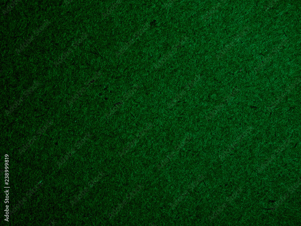 Texture of dark green cardboard closeup, abstract paper background Texture of dark green cardboard closeup, abstract paper background