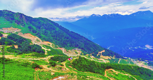 erial panoramic view of mountain landscape of Rosa Khutor tourist resort in Sochi in daytme photo