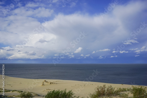 Sea landscape of the Baltic sea with coastal sand dunes of the Curonian spit.