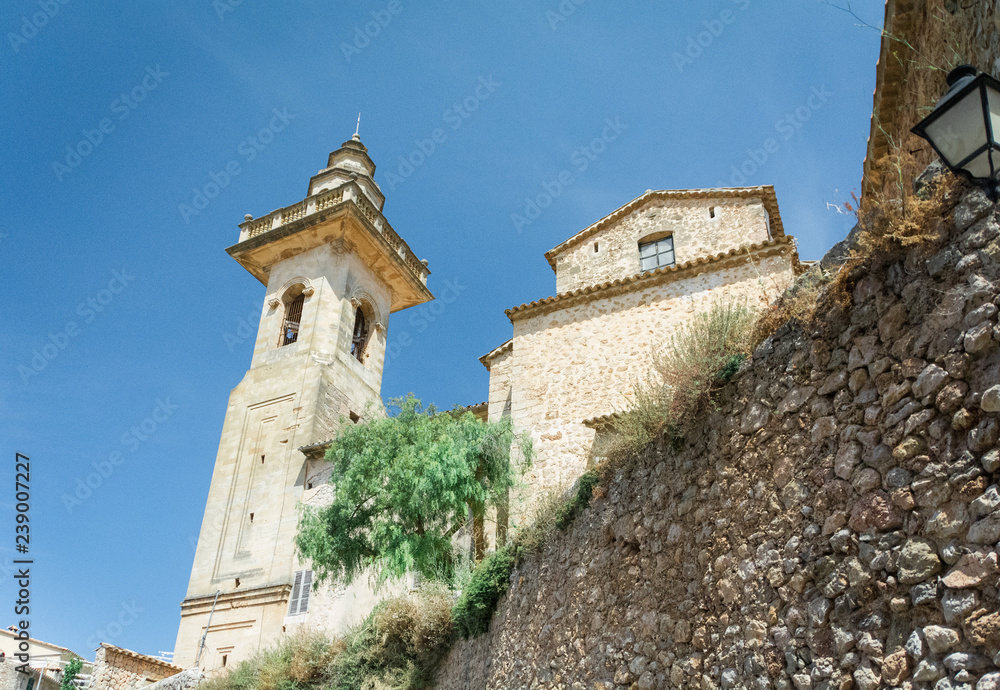 Mallorca, Balearic Islands, Spain - July 21, 2013: Parish Church of Saint Bartholomew in Valldemossa Mallorca, Balearic Islands, Spain - July 21, 2013: Parish Church of Saint Bartholomew in Valldemossa