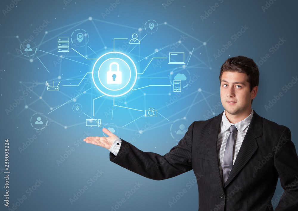 Young smiling person presenting office cloud technology concept
Young smiling person presenting office cloud technology concept