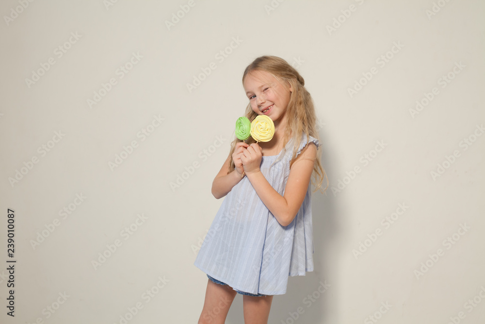 fashion girl eats a candy lollipop cake fashion girl eats a candy lollipop cake