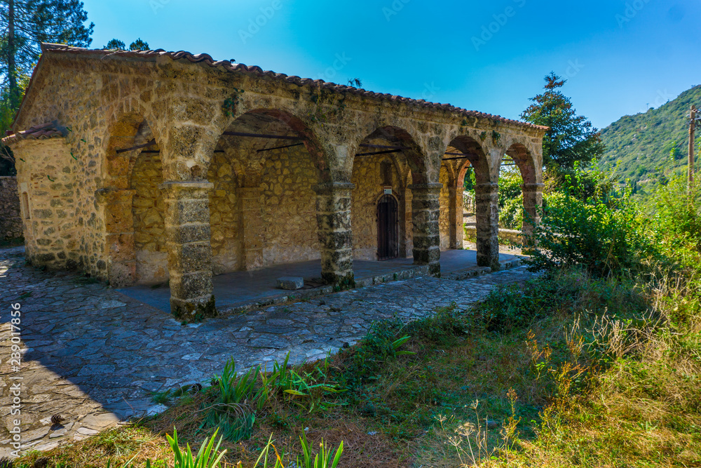 Medieval arched greek orthodox church of Virgin Mary (Panagia Mpafero) in Stemnitsa village, a popular winter destination in mountainous Arcadia in Peloponnese, Greece