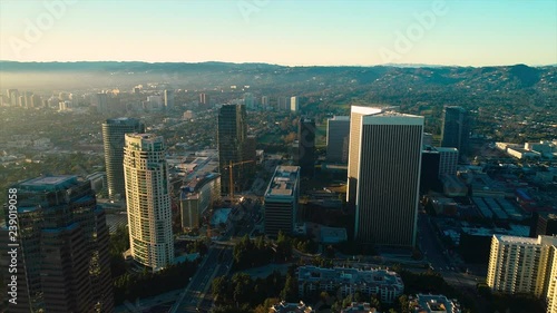 Studio City Los Angeles CA December 2018 sunset 5PM near skyline aerial view with Beverly Hills and the Santa Monica Mountains in background from helicopter drone plane