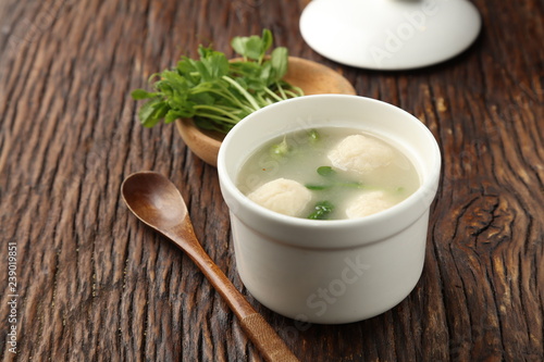 Fragrant Fish balls soup in a white bowl