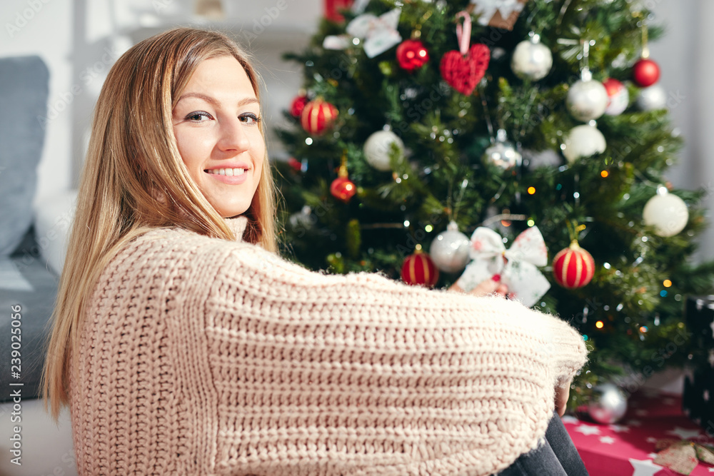 Portrait of beautiful woman enjoying Christmas eve/New Year. Portrait of beautiful woman enjoying Christmas eve/New Year.