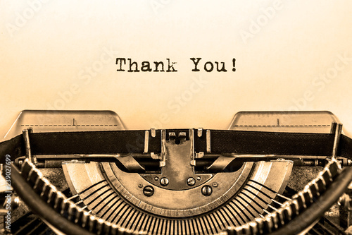 Thank You! printed on a sheet of paper on a vintage printing machine. writer. journalist.