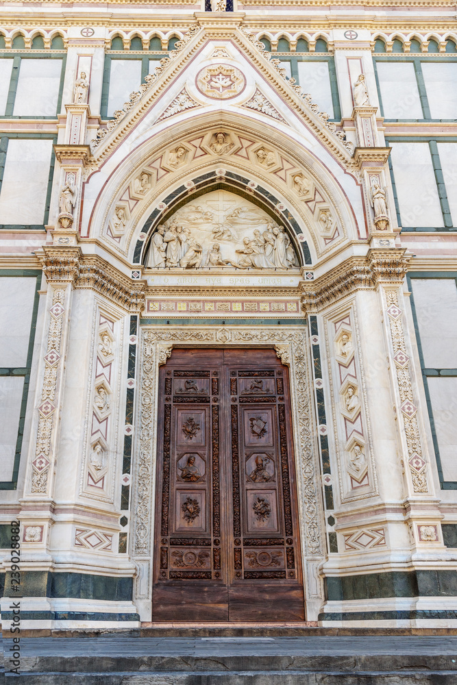 Door of Basilica di Santa Croce or Basilica of the Holy Cross. Florence. Italy