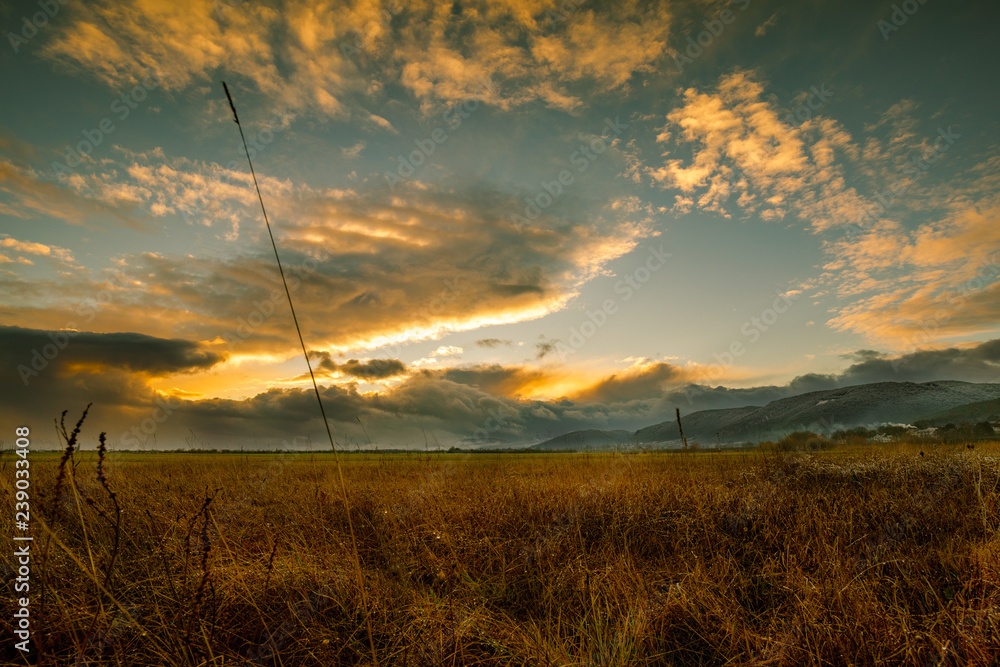 Sunset in autumn over a field in austria Sunset in autumn over a field in austria