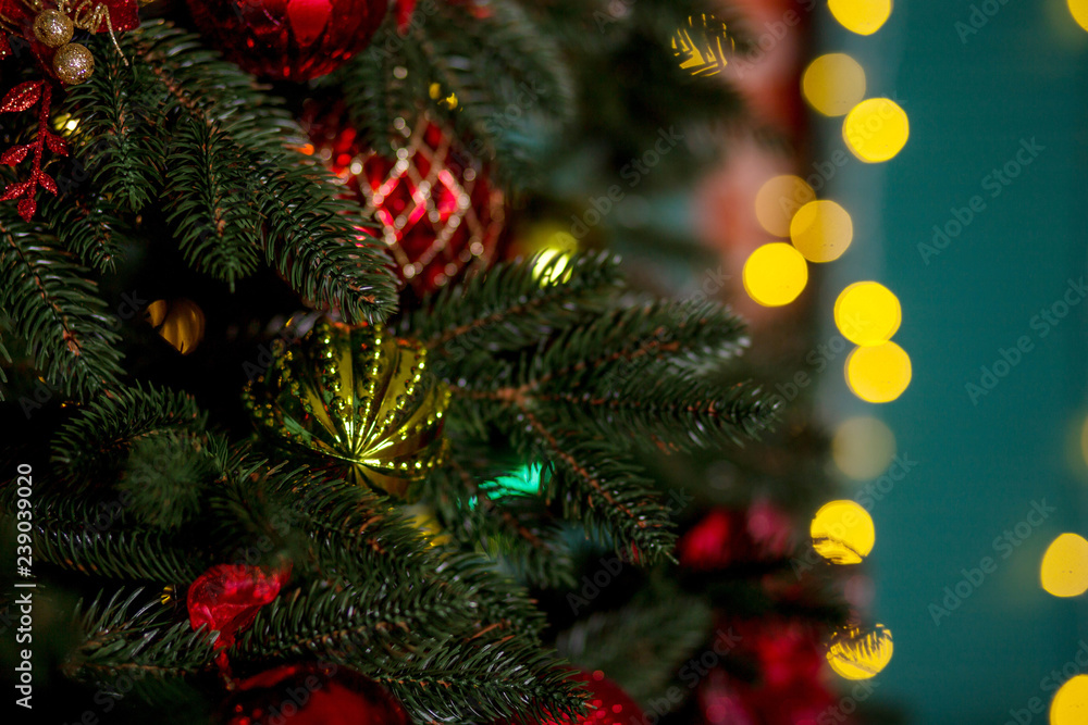 decorated Christmas tree close-up, New Year's scenery, lights in the background