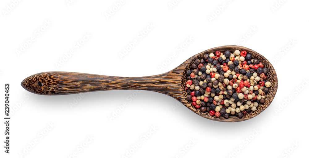 Mixed of peppers hot, red, black, white in wood spoon isolated on white background. Top view Mixed of peppers hot, red, black, white in wood spoon isolated on white background. Top view