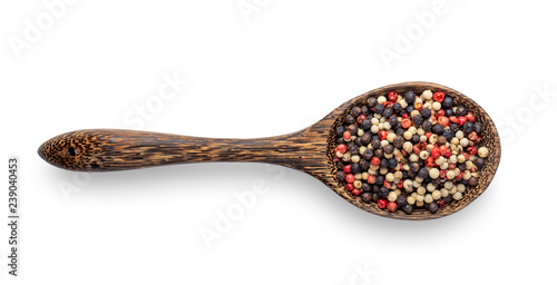 Mixed of peppers hot, red, black, white in wood spoon isolated on white background. Top view