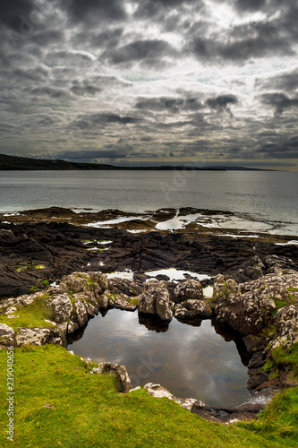 Picturesque Coast With Small Grassy Ponds On The Isle Of Skye In Scotland