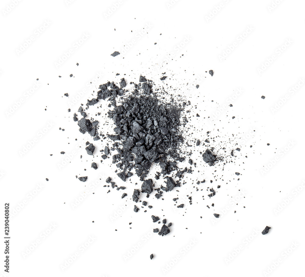 Activated charcoal powder isolated on white background.