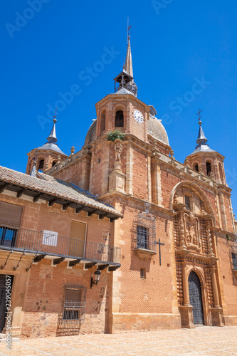 facade of landmark Church of the Christ, from year 1729, of San Carlos del Valle town, in Ciudad Real (Castilla La Mancha, Spain, Europe)