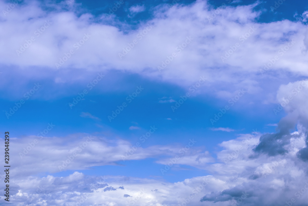 grey stormy clouds on blue sky background grey stormy clouds on blue sky background