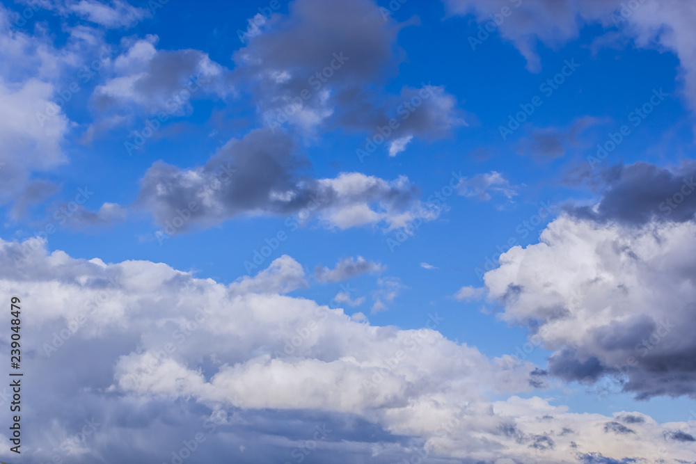 grey stormy clouds on blue sky background grey stormy clouds on blue sky background